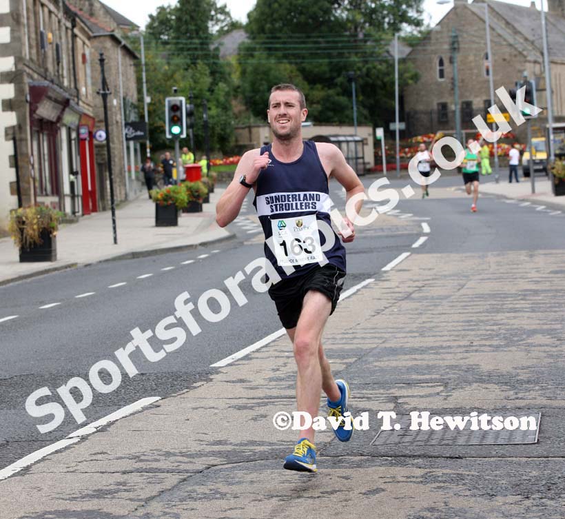 Steve Rankin (Sunderland Strollers) leads through the streets of Prudhoe on his way to winning the Prudhoe Miners Race.
